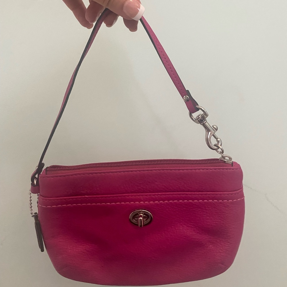 Hot pink coach wristlet